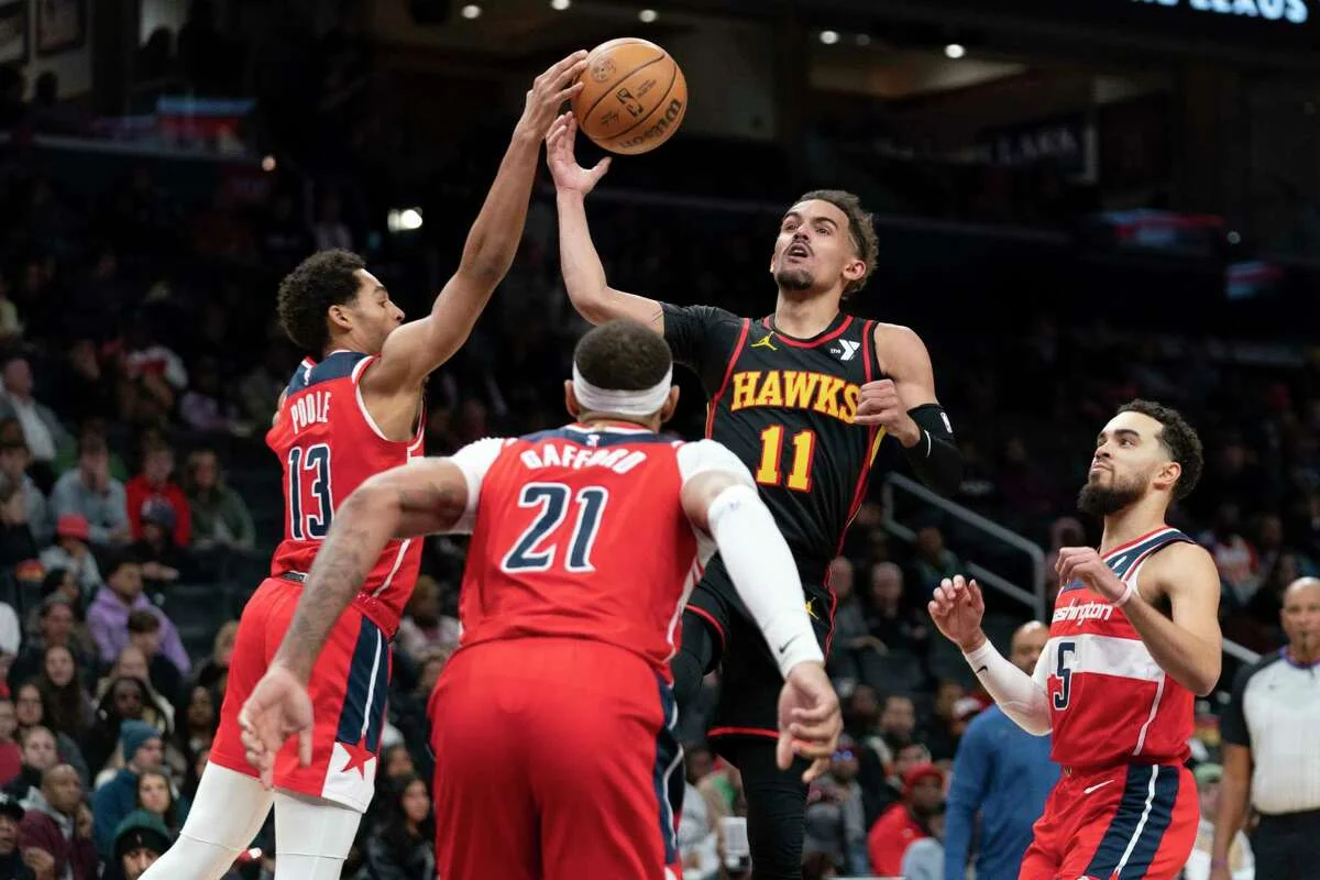 trae-young-guide-son-equipe-vers-la-victoire-dans-la-capitale.webp